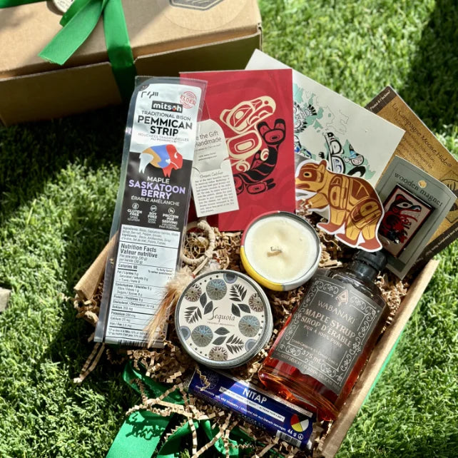A gift box containing multiple Indigenous made items.