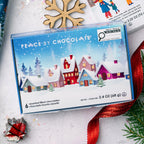 Box of Peace by Chocolate assorted filled chocolates with a winter village design on the packaging.