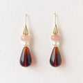 Boucles d'oreilles pendantantes en perles de rose et d'ambre