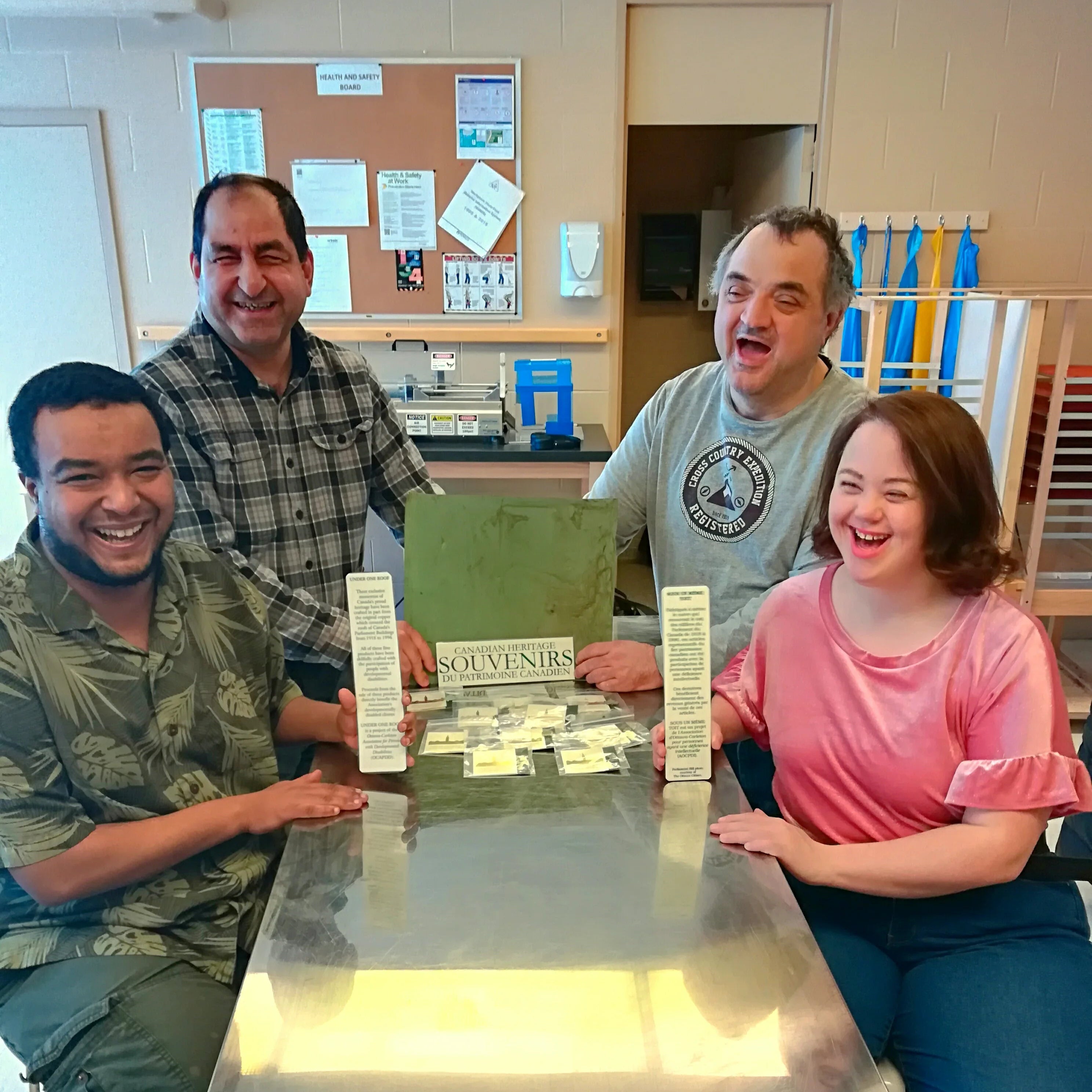 Individuals with special needs employed by Under One Roof. They're the team that make the Pins, Brooches, Earrings, Lapel Pins and framed pieces you get to take home. 