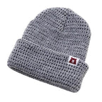Plain light grey marl toque with tiny white label with bear logo on it.