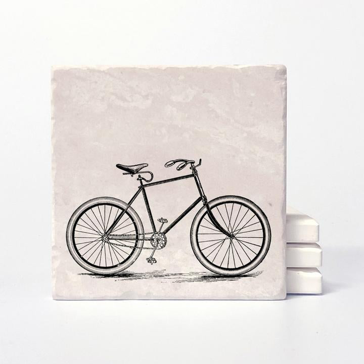 A coaster with a vintage bike printed on it.