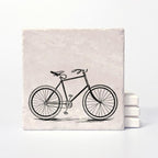 A coaster with a vintage bike printed on it.