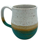 Tasse turquoise et blanche