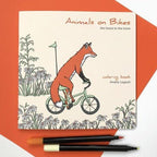 Animals on Bikes (Forest to Town) Colouring Book (Final Sale) - Amelie Legault