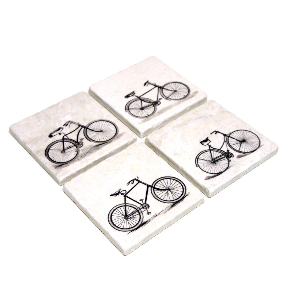Four coasters with a vintage bike printed on it.